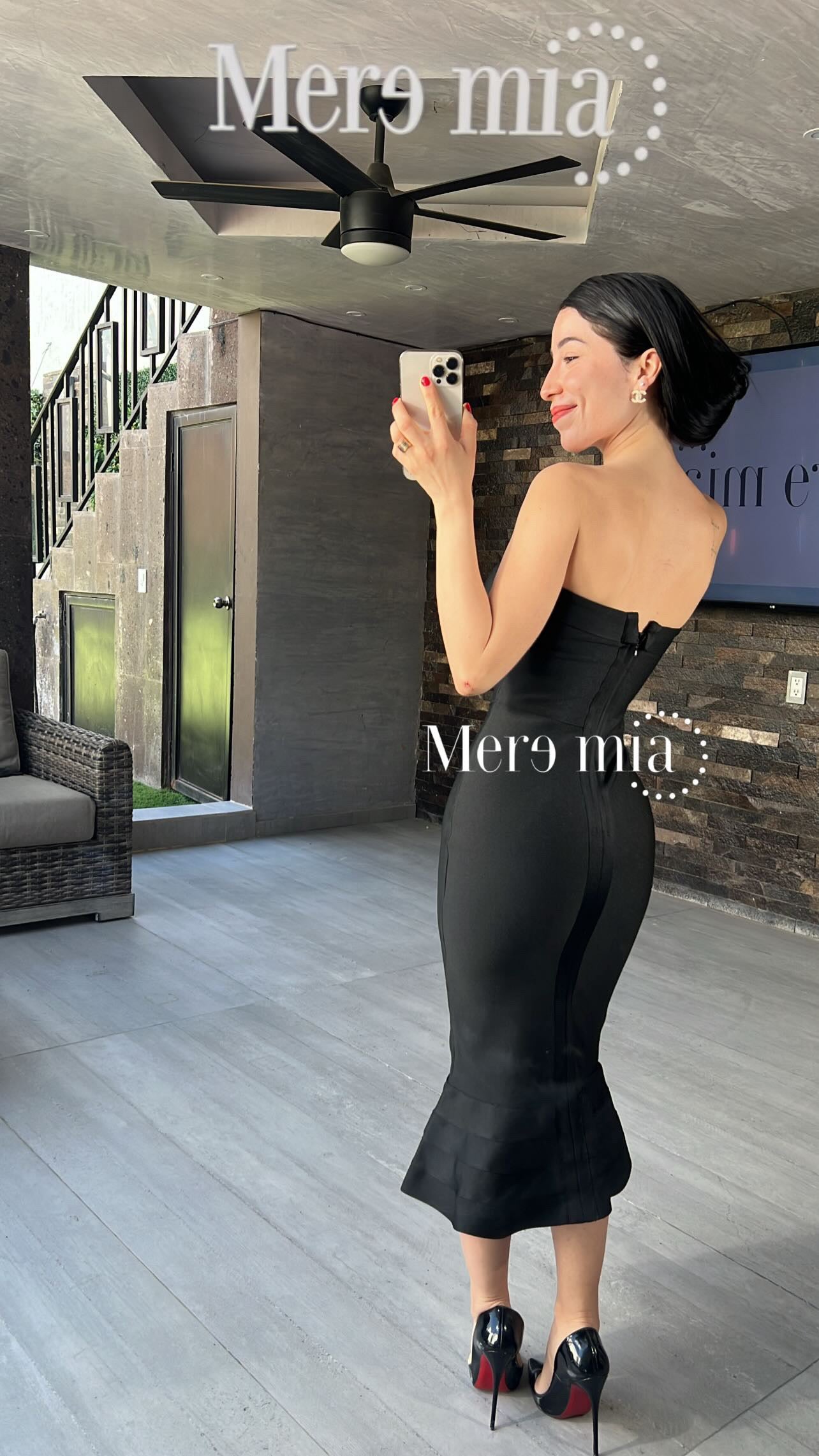 Vestido negro olan abajo